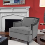 Dulux photo of red walls with a white fireplace and a rich grey chair on a white rug