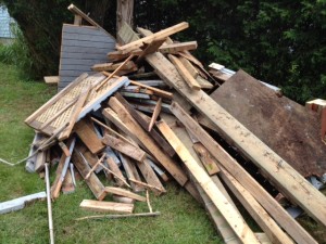 pile of wood that used to be our deck