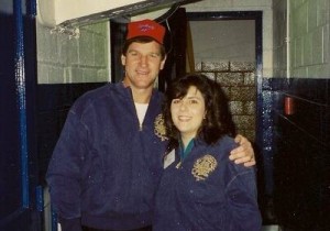 Bobby Orr and me wearing matching blue sweaters. He has his arm around me and I'm beaming