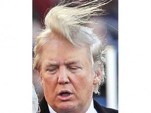 Donald Trump caught in a breeze. His combover rises in the wind and folds back over his head.