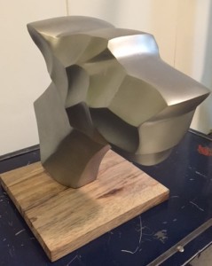 silver-coloured metal dog head sculpture