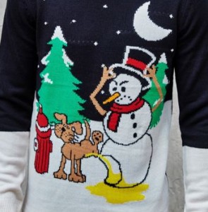 sweater features a dog ignoring a fire hydrant and peeing on a snowman who is reacting angrily