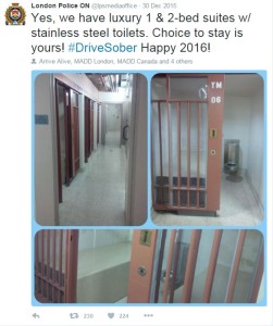 Photo of jail cells with the message: yes, we have 1 and 2 bedroom suites with stainless steel toilets. Choice to stay is yours! Drive sober. Happy 2016.