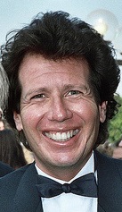 close-up of Garry Shandling in 1987, smiling widely
