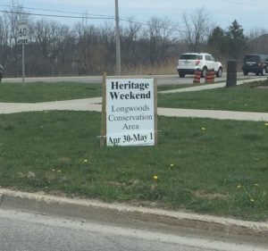 Roadside sign for the Longwoods Heritage weekend with the dates obviously altered from last year's to this year's: April 30 - May 1.