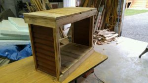 bathroom vanity with a hole cut out to place an electric fireplace in