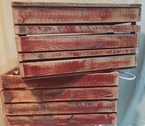 red-grey crates with natural patina from weather and time