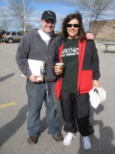 Richard Bloom, about 30 years old, in jeans and a hoodie, and me, wearing track pants, a 680 News T shirt and jacket