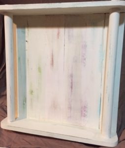 large tray with colours showing through lightly distressed cream paint