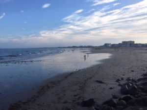 mostly deserted, long, sandy beach