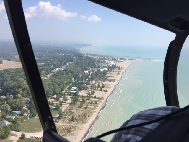 Port Stanley Beach on the shore of Lake Erie as seen through the helicopter windshield
