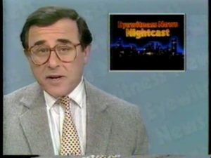 screenshot of Irv at the anchor desk from YouTube