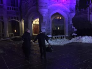 Rob and Erin are hand-in-hand as we walk up to the front of the castle at about 520 am. It's still dark out.