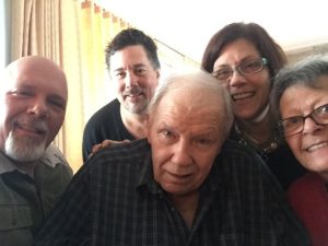 Selfie of my brother Kevin, Derek, Dad, me and Mom.