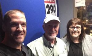 Brian Salt flanked by me and Ken in front of the 1290 CJBK banner