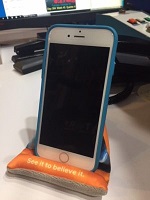 iPhone sitting on a stand