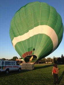 as the balloon inflates, I'm watching from a distance