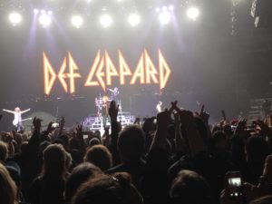 a shot of the stage with the Def Leppard logo huge and lit up