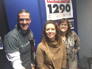 Ken, Jillian and me posing in our studio beneath a News/Talk 1290 CJBK sign. Jillian looks healthy and radiant. 