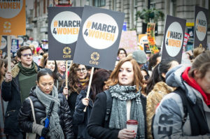 Women marching in the March 4 Women in London, England