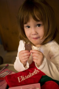 a little girl named Libby eating chocolate