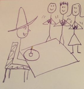 stick figure drawing of Rob wearing a big hat sitting in front of a cupcake with a lit candle in it and three people clapping