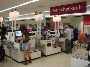 Self-checkout in use at a store 