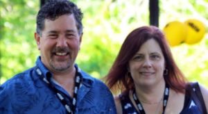 Derek and I smiling, obviously out of doors on a sunny day. We were at a park in Wingham for a CKNX reunion