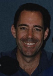 Barry Williams cropped out of a photo of him and me