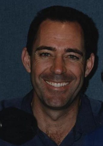 Barry Williams cropped out of a photo of him and me
