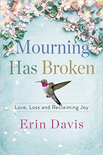 The cover of Erin's book is light blue with a hummingbird on it