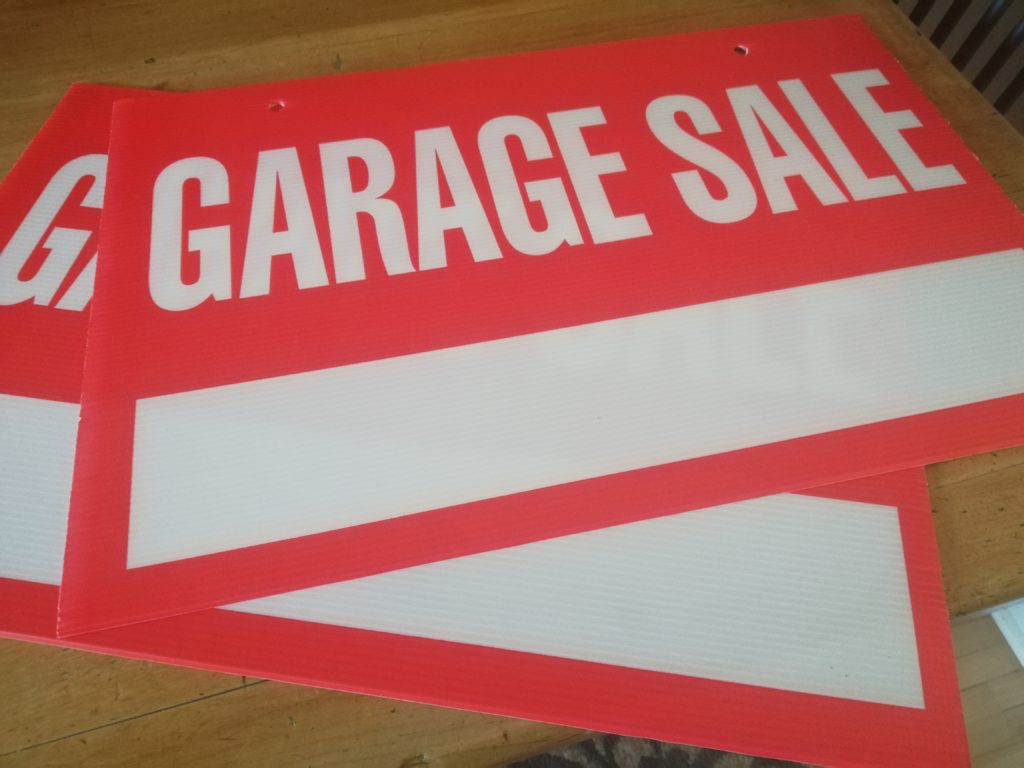 garage sale signs, with the address not yet filled in