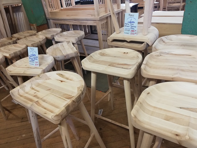 Tractor stools are wooden stools that are grooved to cradle the butt. 