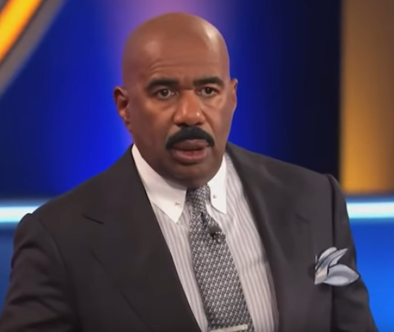 Steve Harvey looking stunned by something a contestant said on Family Feud. 