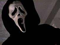 White-masked character from the movie Scream, screaming. 