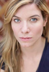 Closeup of actress Tessa Ferrer, long blond haired 30-something woman.