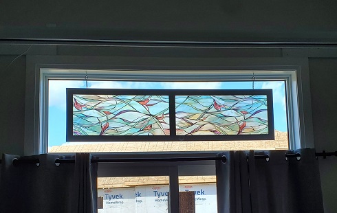 The finished "door" hangs in the transom looking to the untrained eye like a piece of stained glass. 