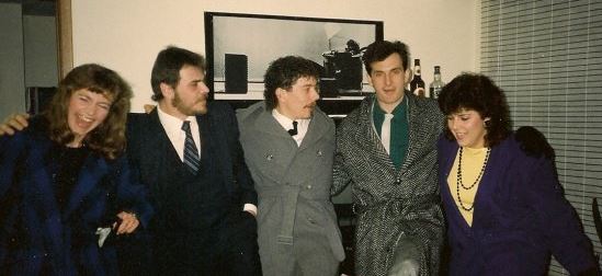 Five of us, including me and Derek, doing the can-can with our coats on before heading out to a party.