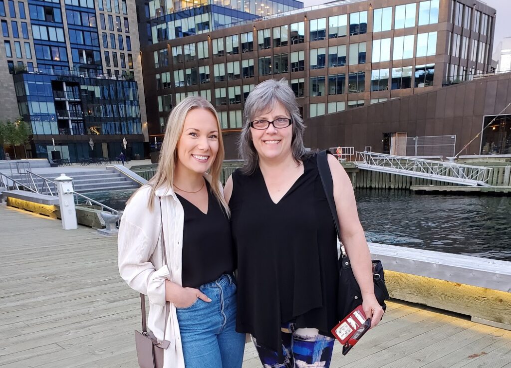 Ceilidh, blond in her mid 20s wearing jeans, and me, posing at the Halifax harbour.