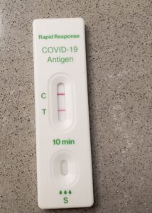 my covid test showing 2 red lines meaning I tested positive for Covid-19