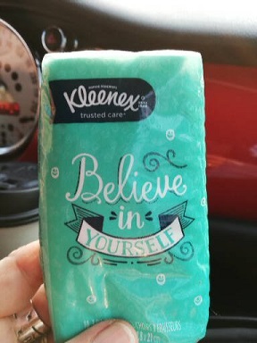 small pack of Kleenex reads Believe in Yourself on the front