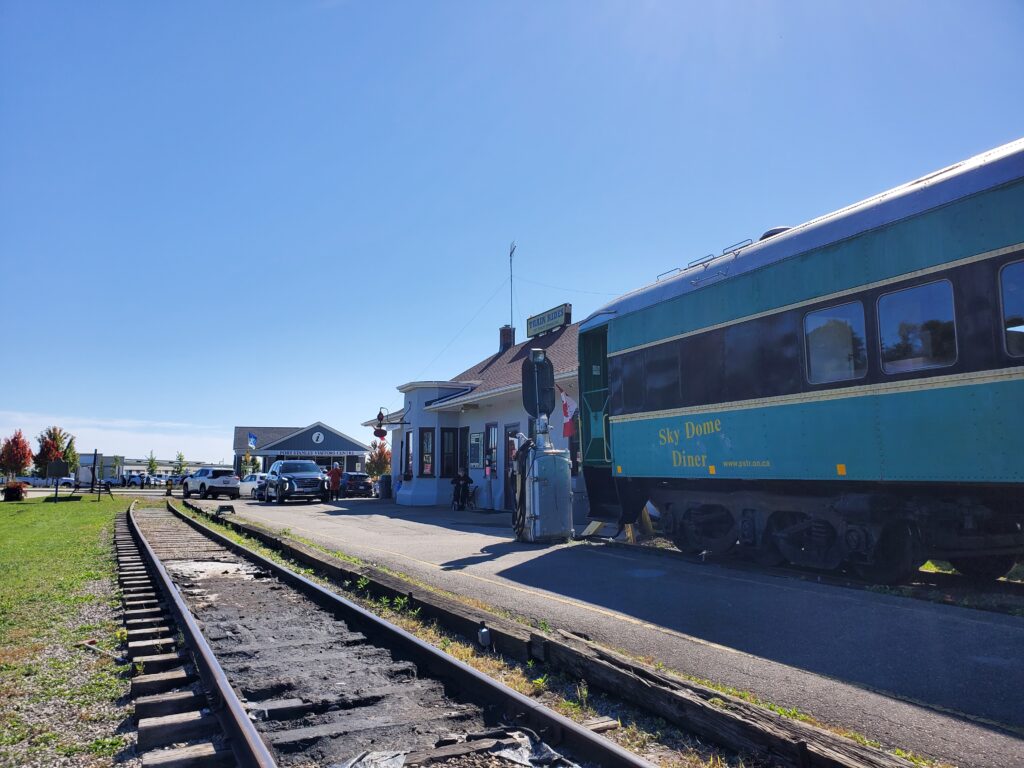 view of the Port Stanley train station from the rail cars on the tracks