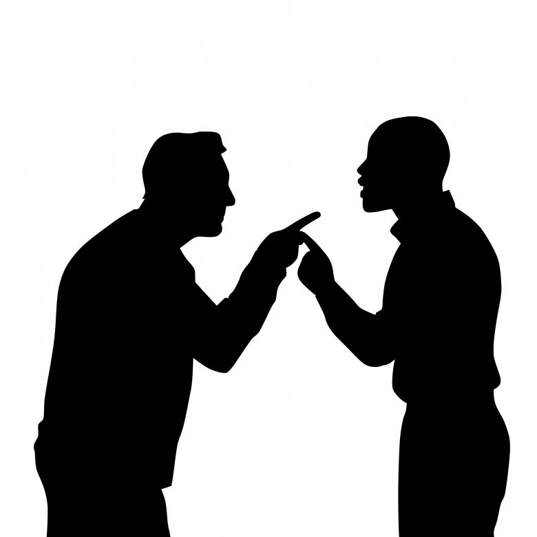 Two men arguing, in black silhouette