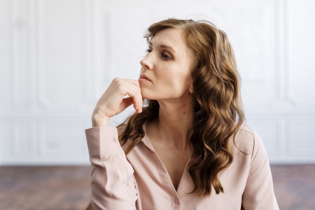 woman in white button up shirt