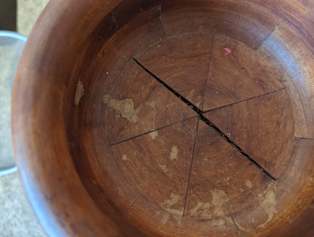 The inside bottom of the bowl is worn and it's splitting in the middle 