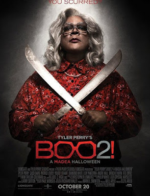 The poster for Perry's Boo 2 a Madea Halloween movie with Perry dressed as his old lady character, Madea.