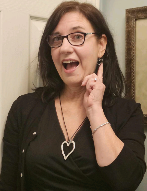 G and F listener Stella wears her heart pendant and earrings.