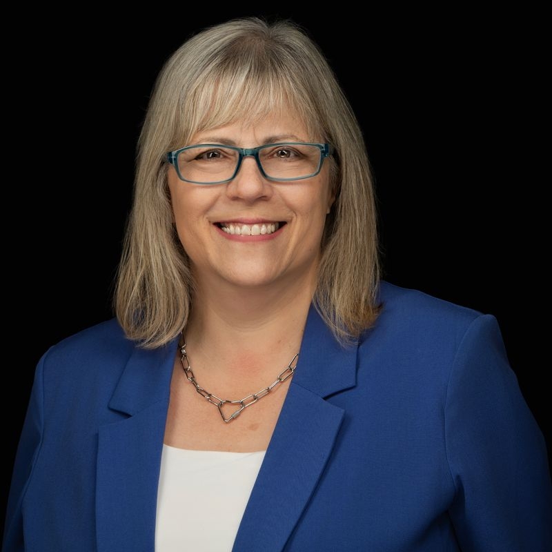 new headshot done this past summer. Me, glasses, blue jacket and white shirt.
