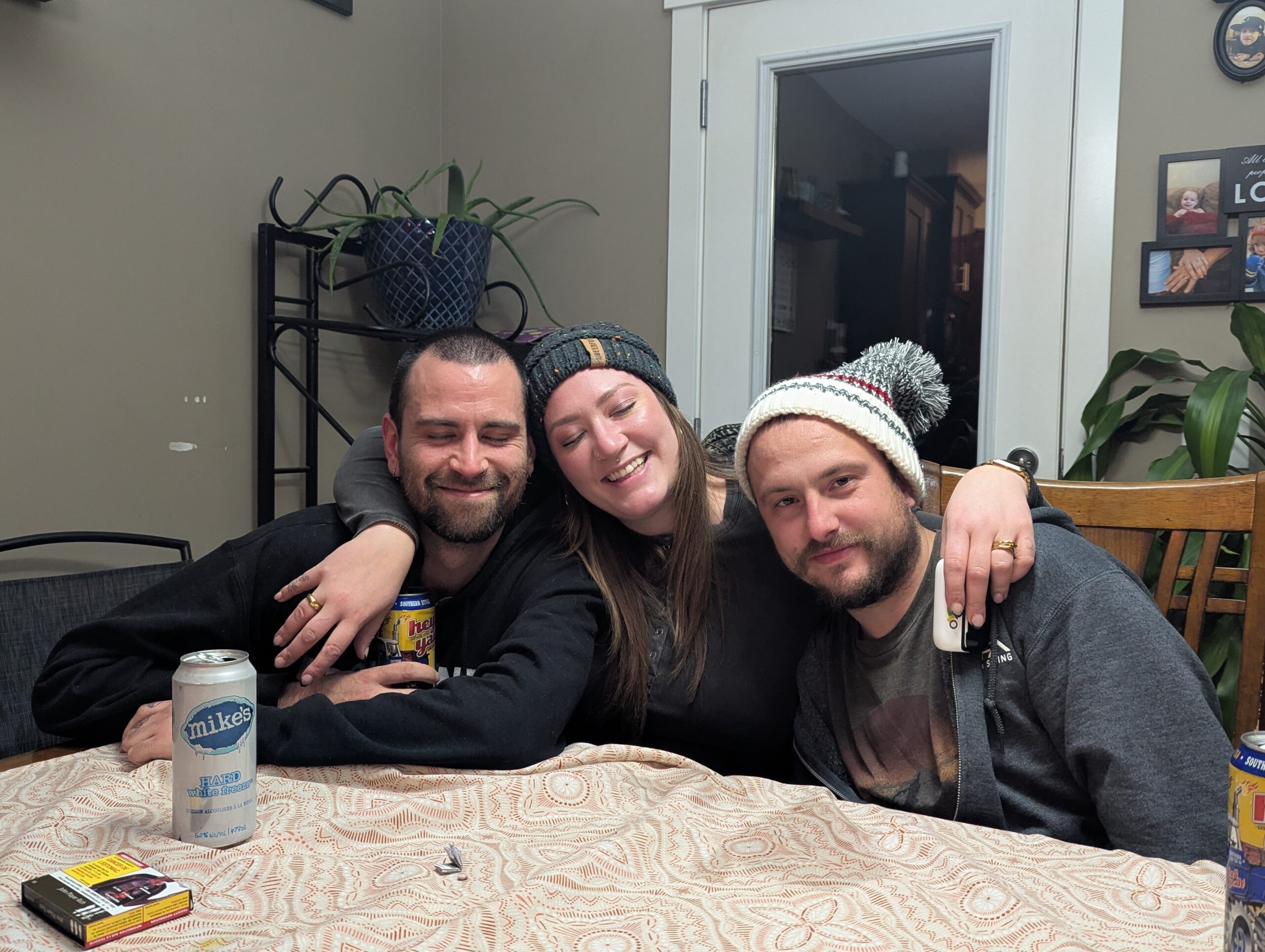 Lukas, Carly-Anna, Kort, at a family dinner.
