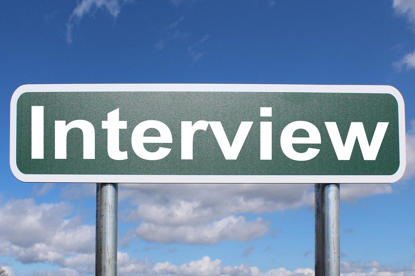 The word Interview on a road sign.